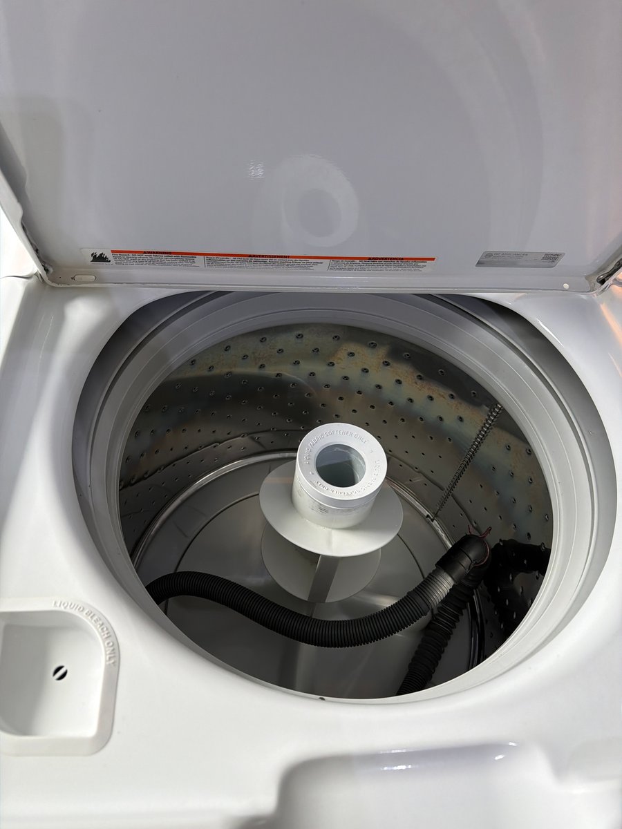 Photo 2 of this exact GE Top load washer and a dryer set