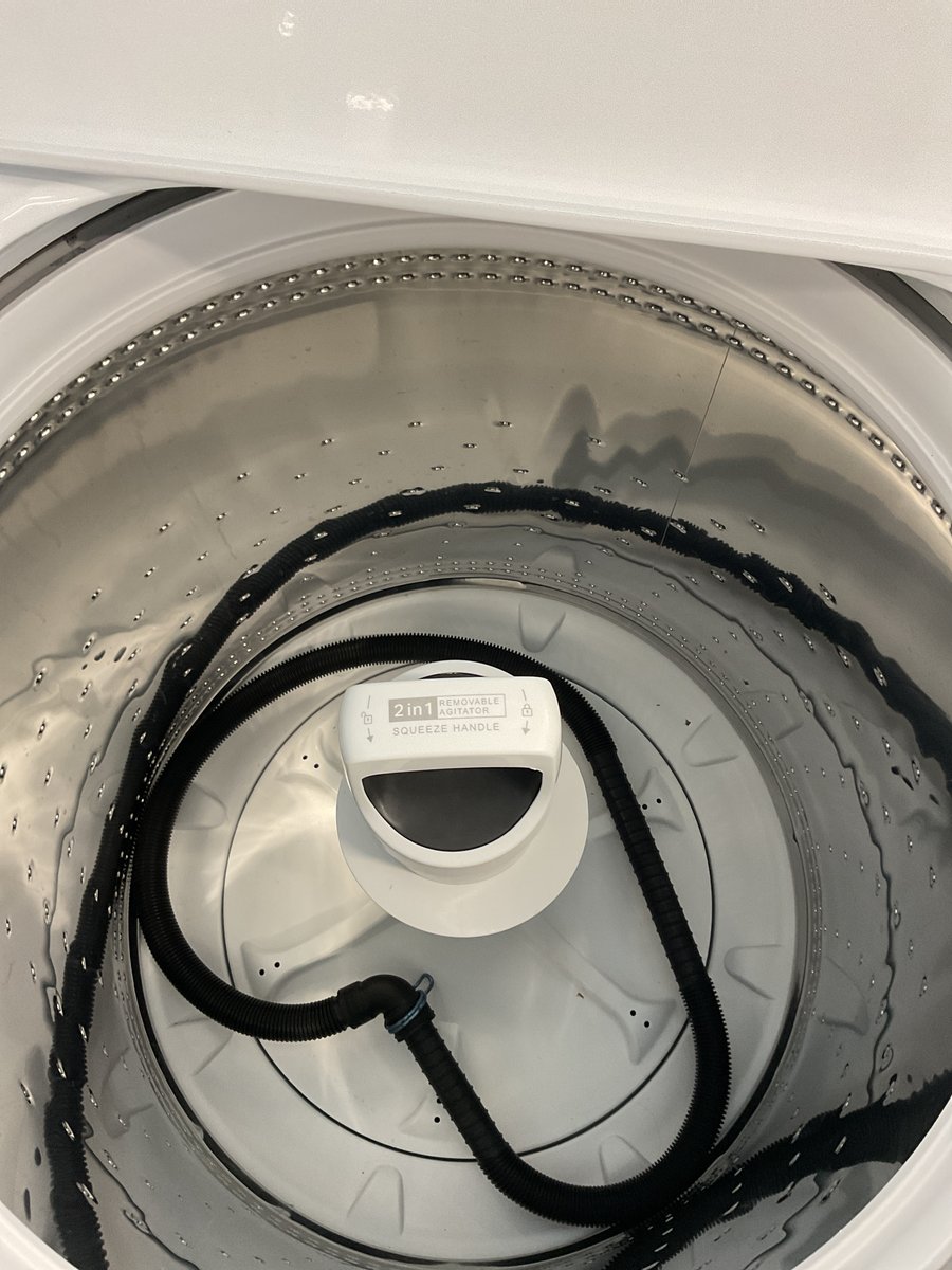 Photo 3 of this exact Whirlpool Top load washer and dryer set