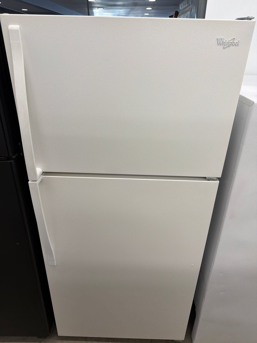 Photo 1 of this exact Whirlpool White top mount refrigerator