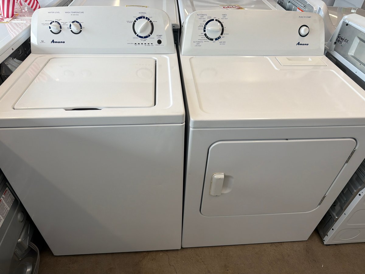 Photo 1 of this exact Amana top load washer and dryer set