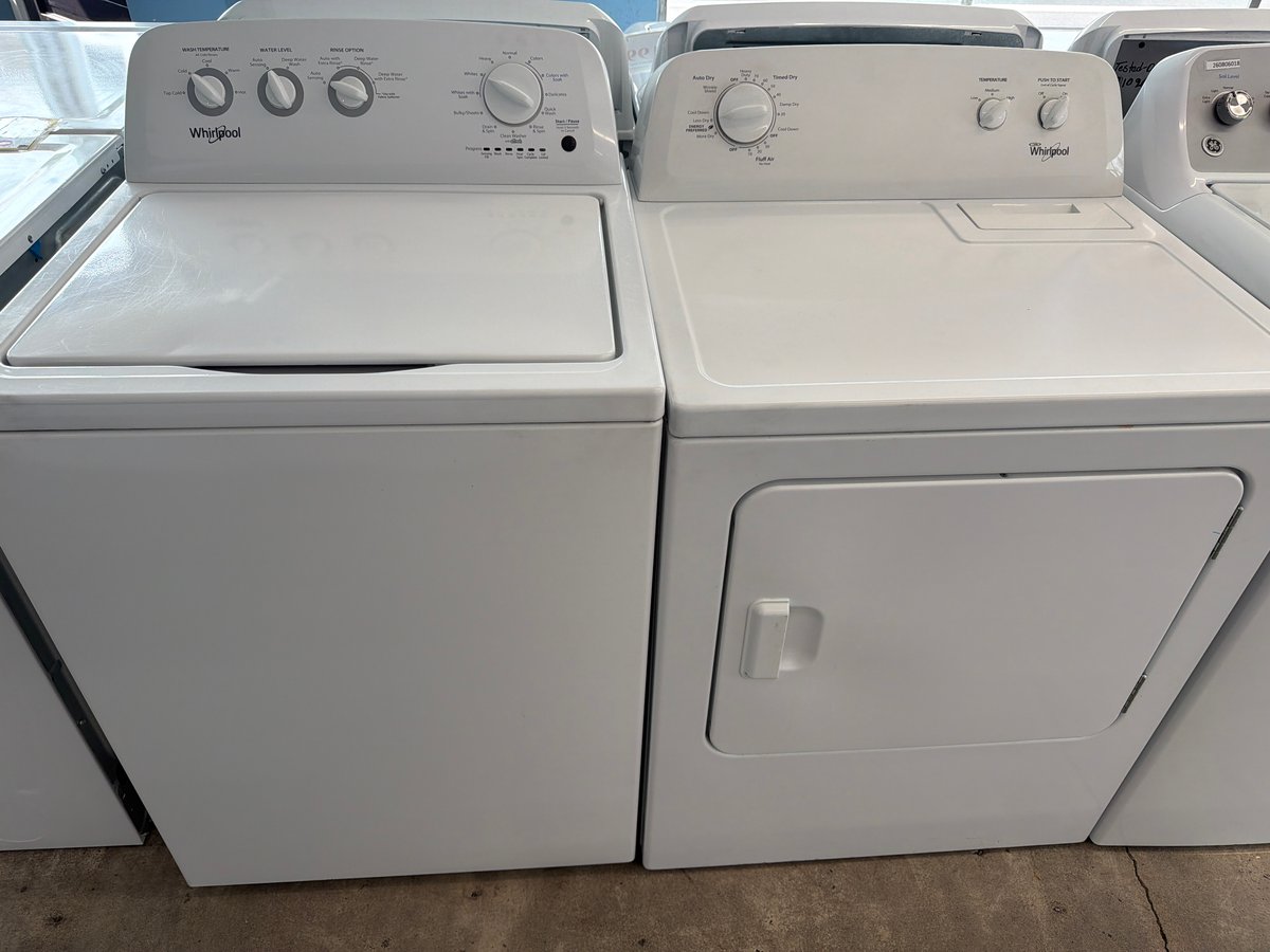 Photo 1 of this exact Whirlpool Top load washer and dryer set