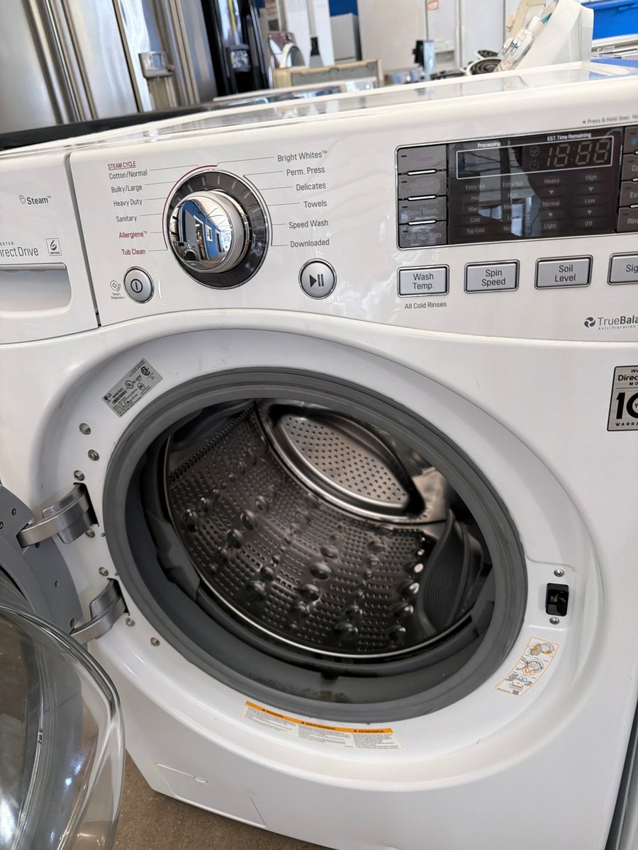 Photo 2 of this exact LG Front load white washer and dryer set