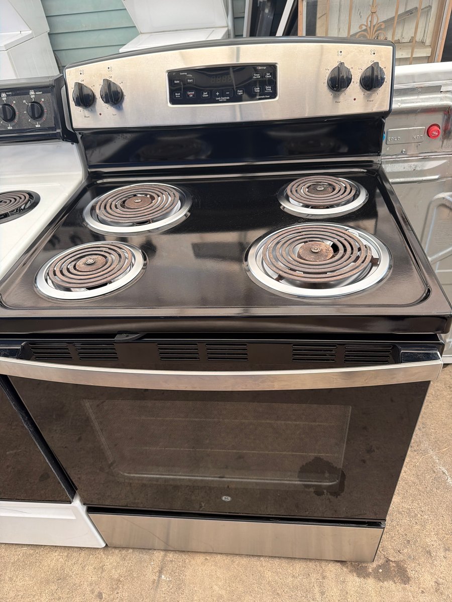 Photo 3 of this exact GE Coil top stainless steel range