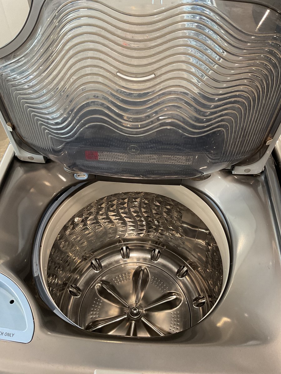 Photo 3 of this exact Samsung Top load charcoal color washer and dryer