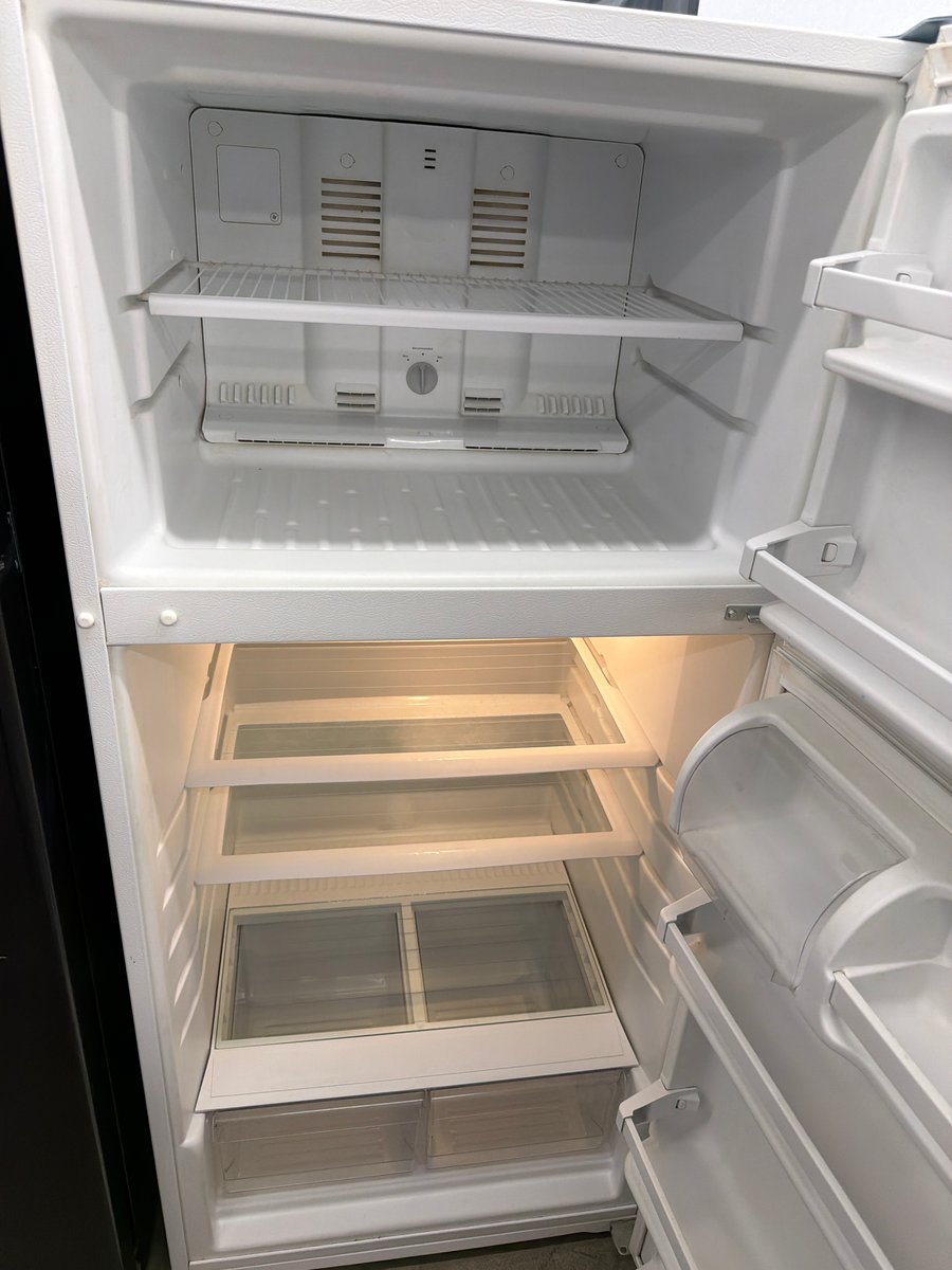 Photo 2 of this exact Whirlpool White top mount refrigerator