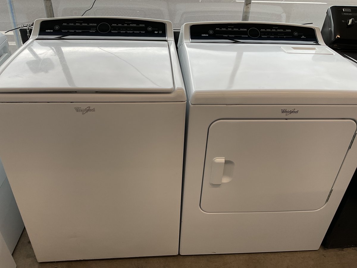 Photo 1 of this exact Whirlpool Top load washer and dryer
