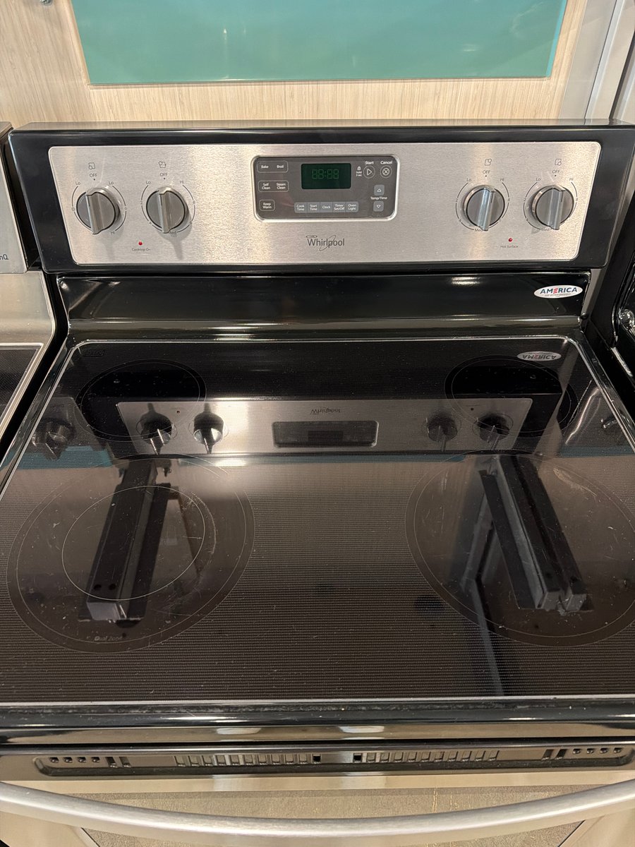 Photo 3 of this exact Whirlpool Stainless steel glass top range