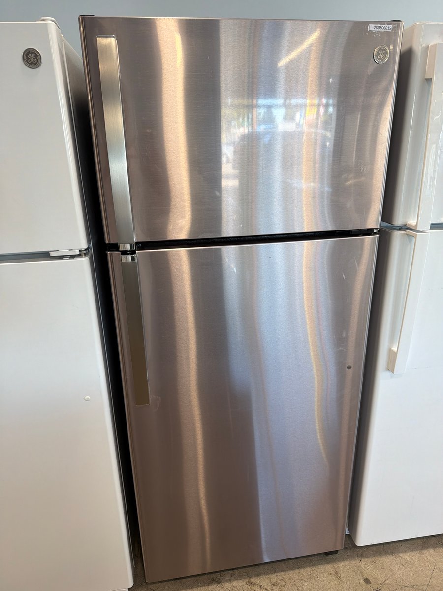 Photo 1 of this exact GE New open box stainless steel top mount refrigerator