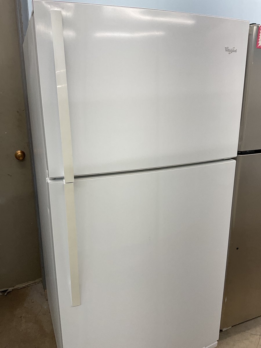 Photo 1 of this exact Whirlpool Top mount white refrigerator