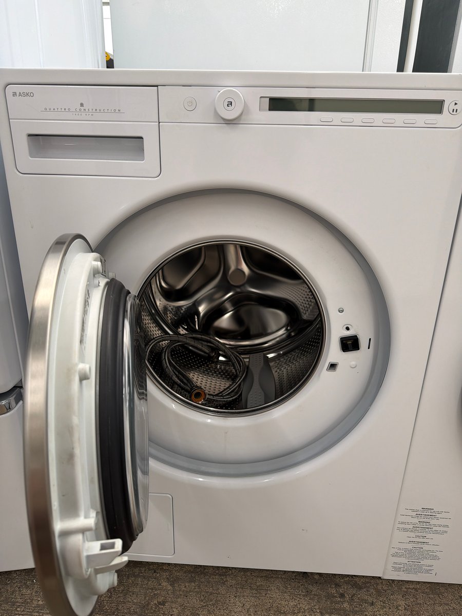 Photo 2 of this exact Asko front load washer and dryer set
