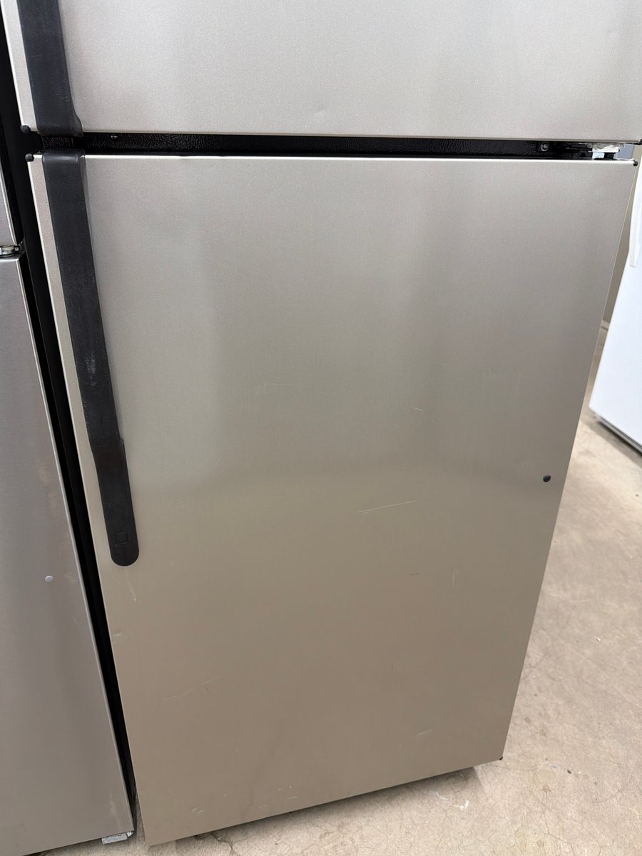 Photo 3 of this exact Hotpoint Silver color top mount refrigerator