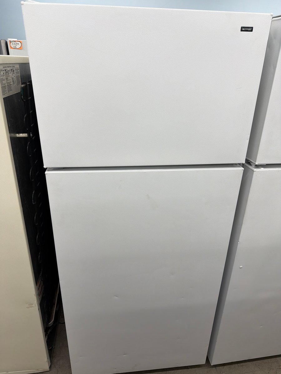 Photo 1 of this exact Hotpoint White top mount refrigerator