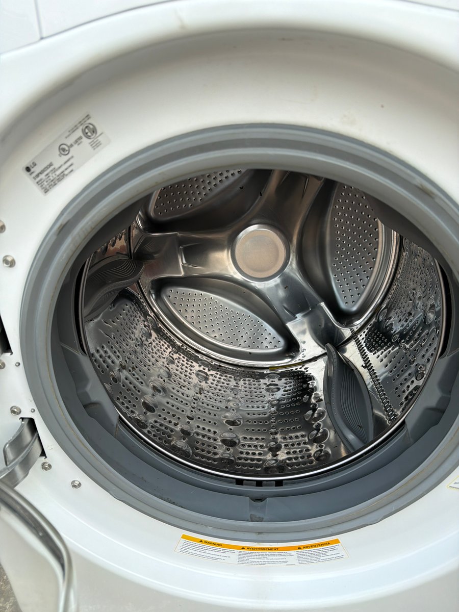 Photo 2 of this exact LG Front load washer and dryer set