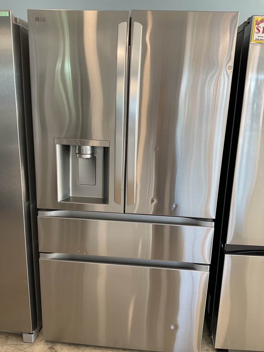 Photo 1 of this exact LG Four doors stainless steel refrigerator