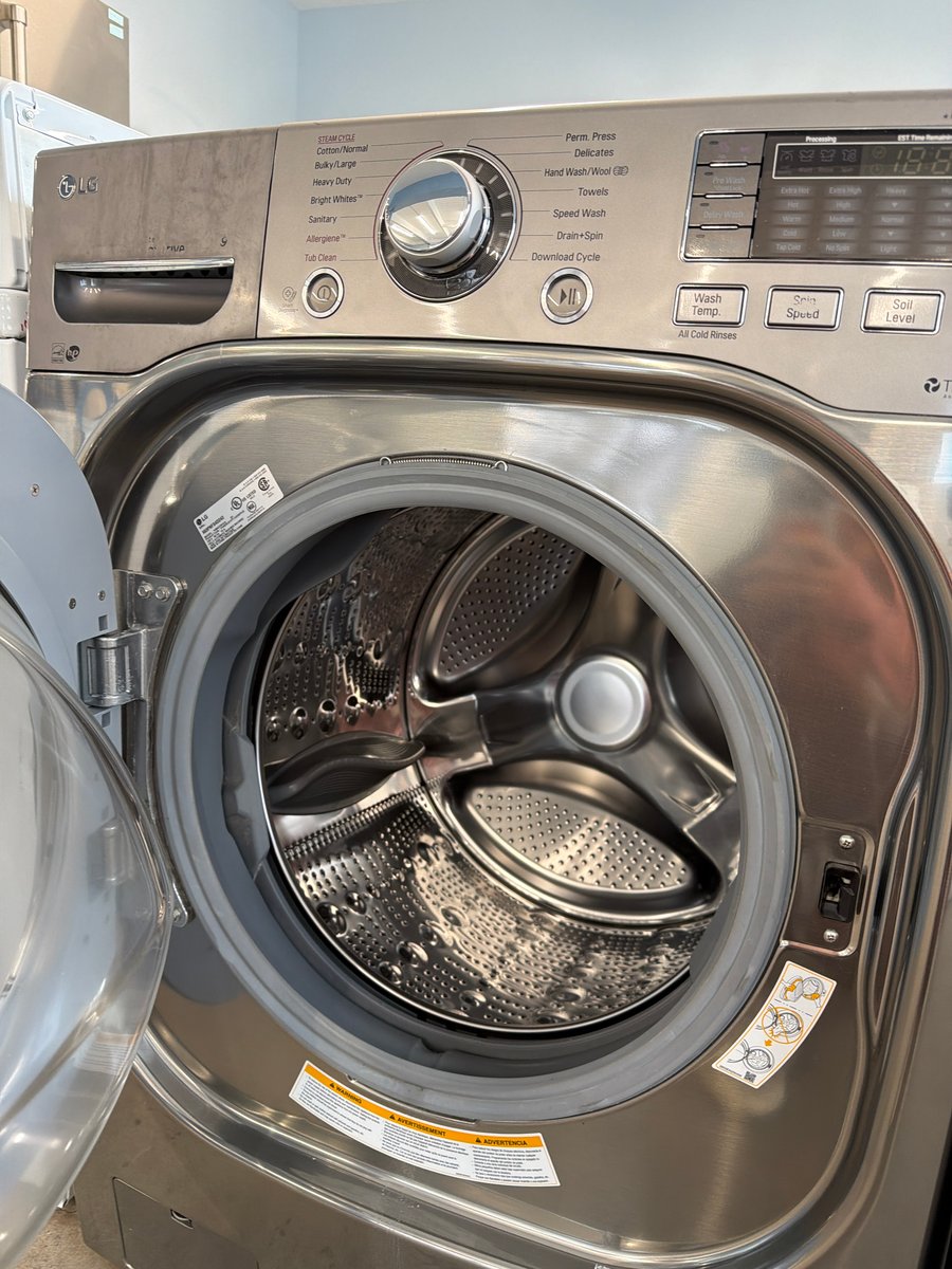Photo 2 of this exact LG 54" Washer & dryer set