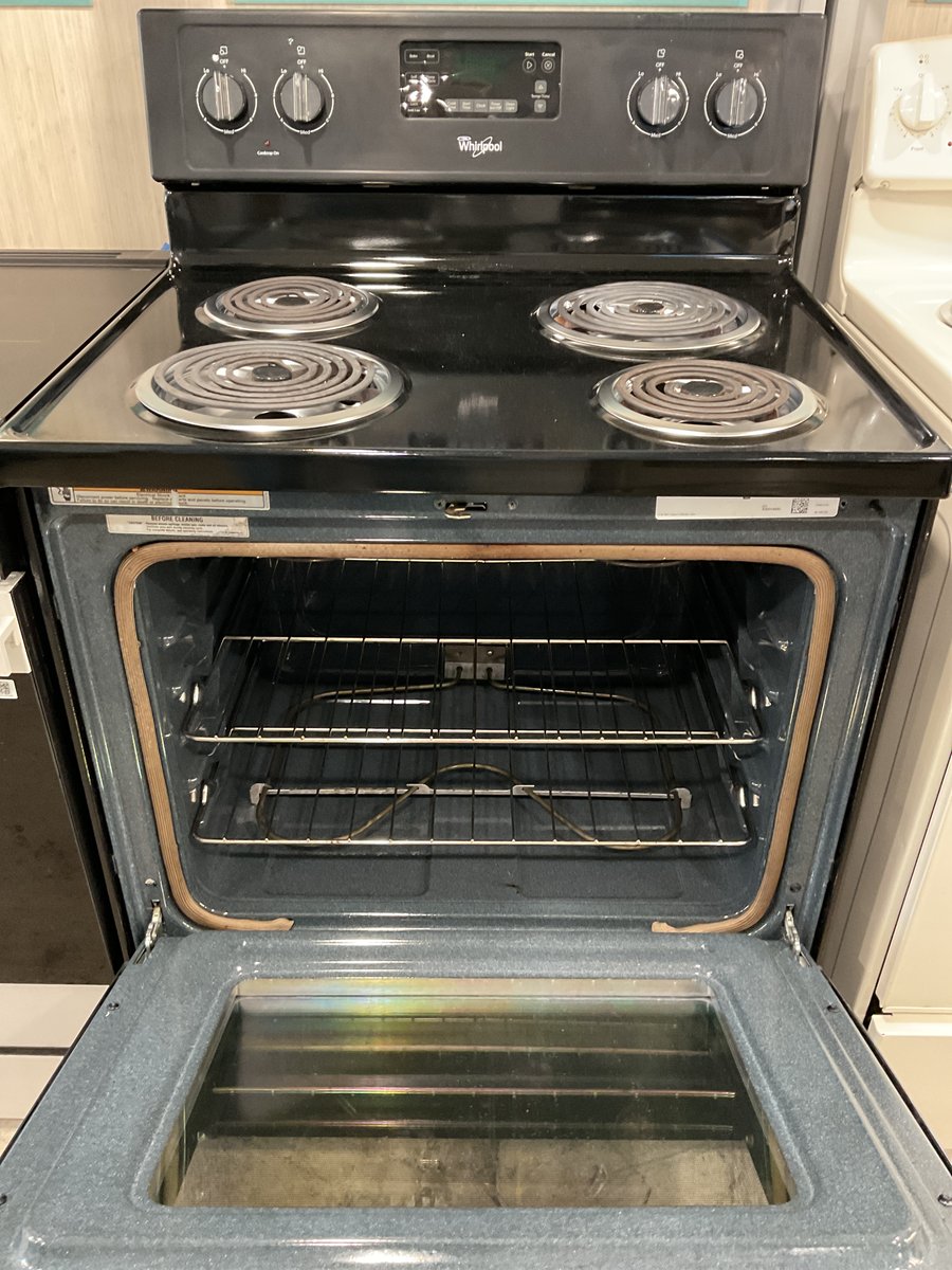 Photo 2 of this exact Whirlpool Black coil top range