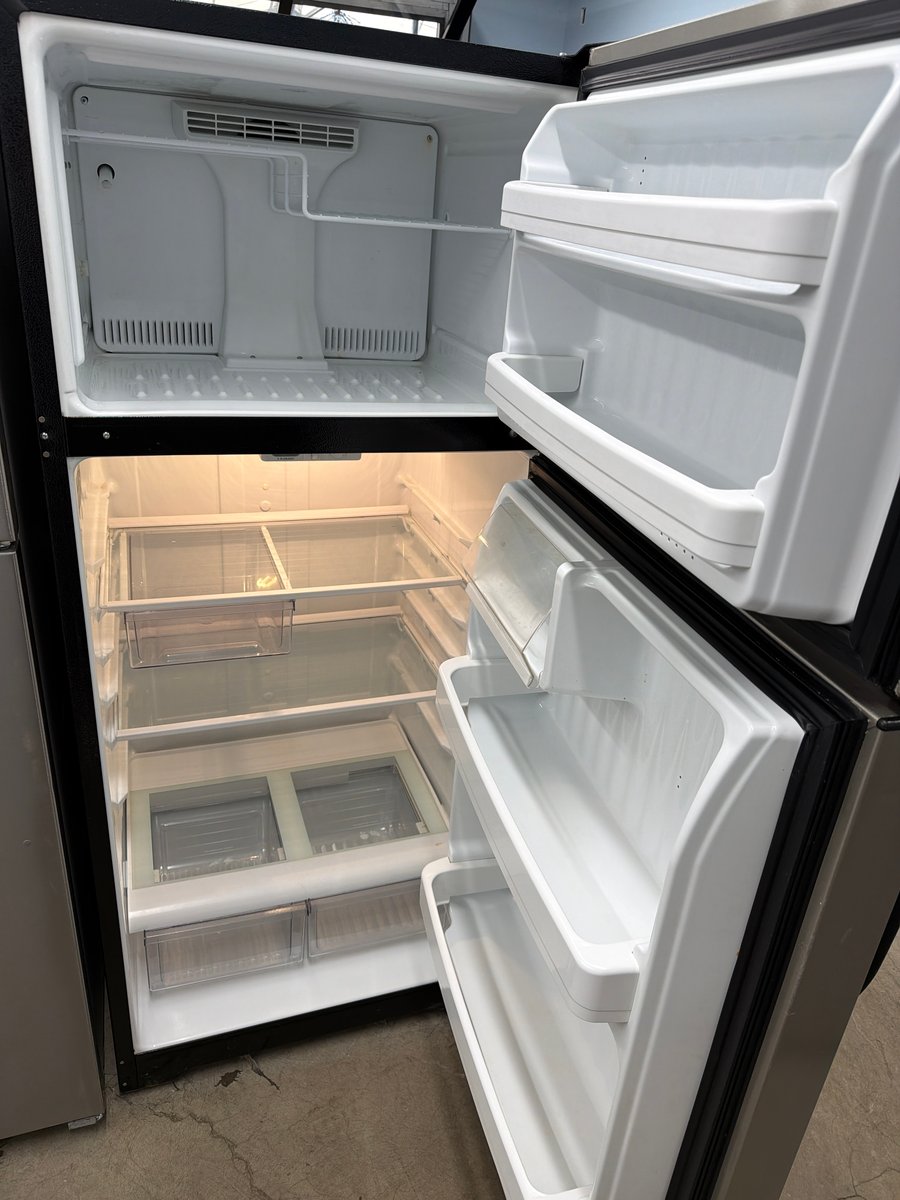 Photo 2 of this exact Hotpoint Silver color top mount refrigerator