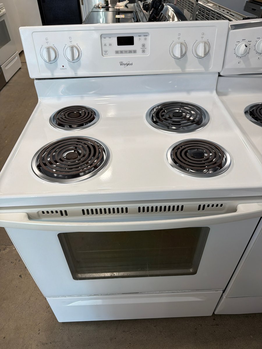 Photo 1 of this exact Whirlpool White coil top range