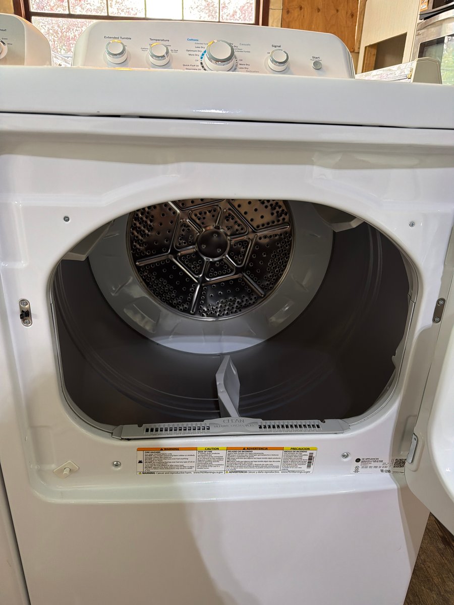 Photo 3 of this exact GE Top load washer and a dryer set