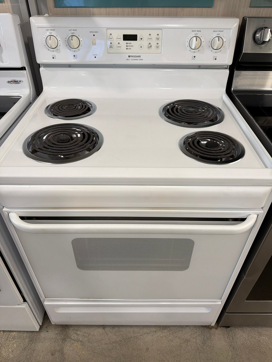 Photo 1 of this exact Frigidaire White coil top range