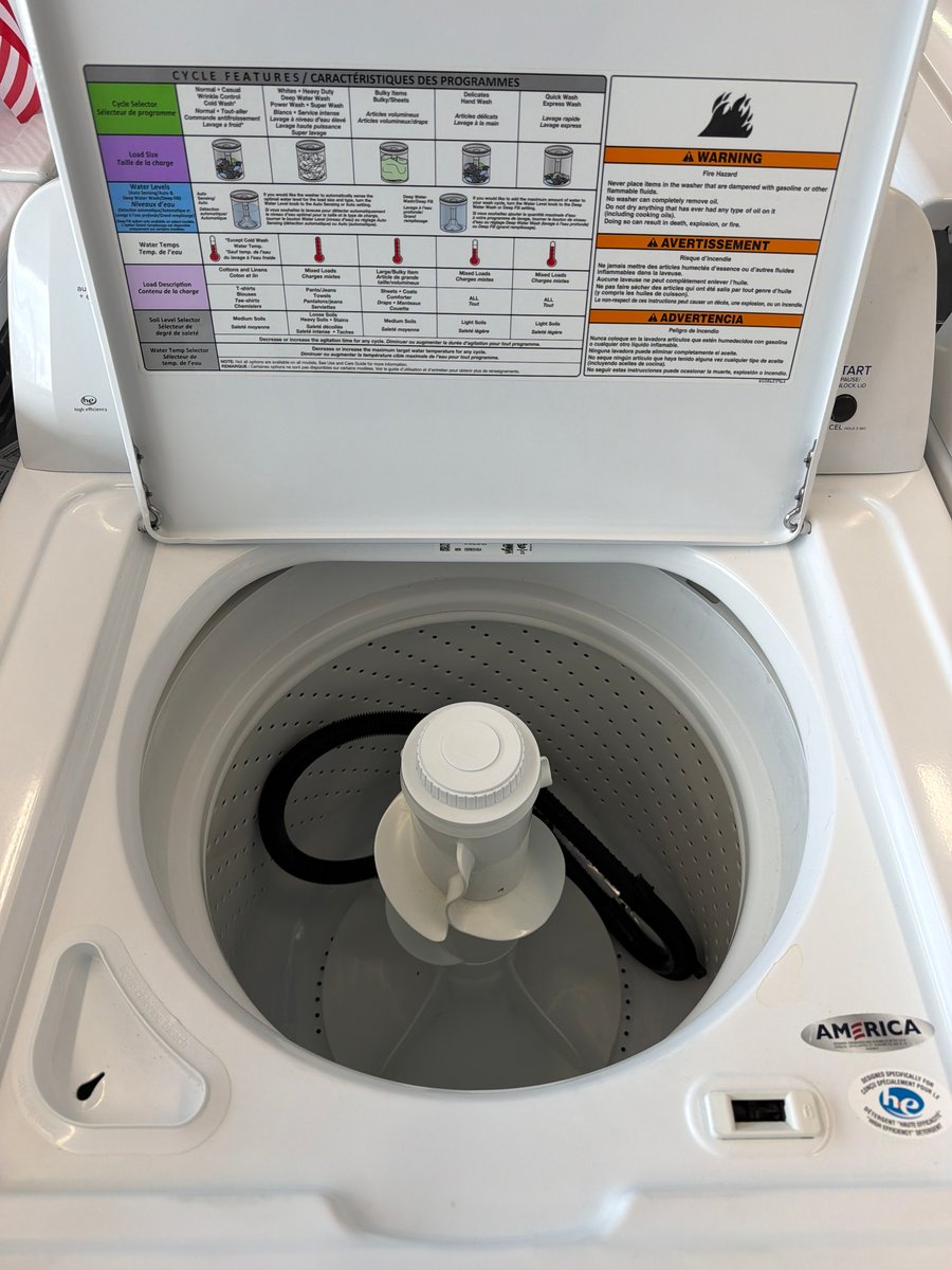 Photo 2 of this exact Amana top load washer and dryer set