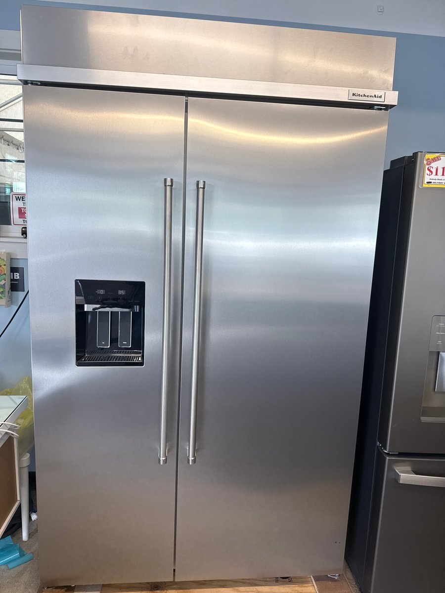 Photo 1 of this exact KitchenAid 48”, 29.4cu.ft, built in side by side refrigerator in stainless steel