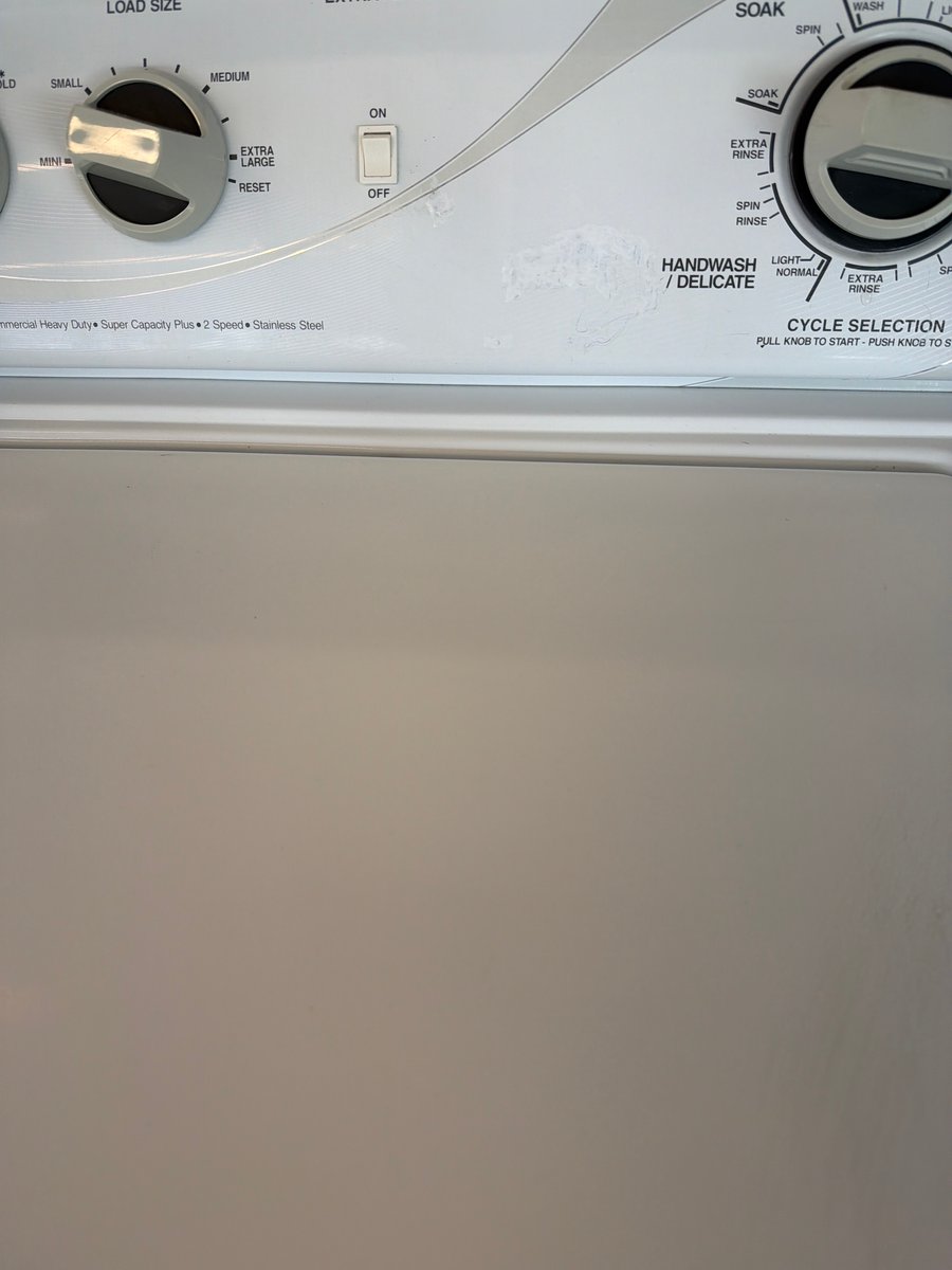 Photo 4 of this exact Speed Queen Top load washer and dryer set