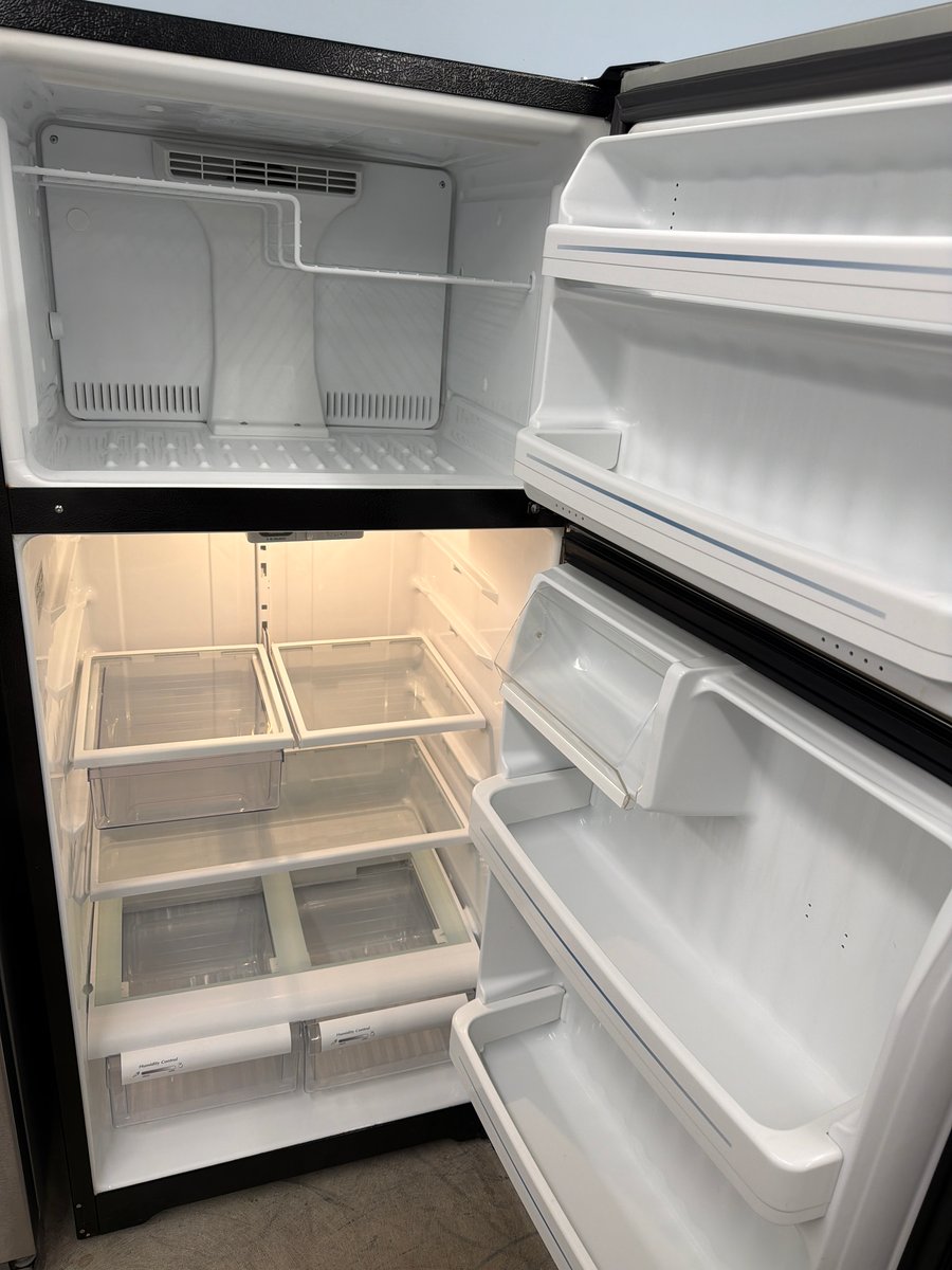 Photo 3 of this exact GE Mat stainless steel top mount refrigerator