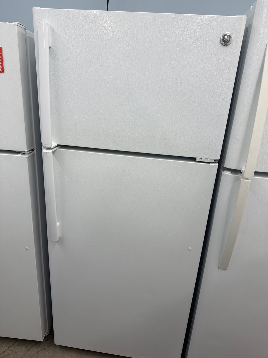 Photo 1 of this exact GE White top mount refrigerator
