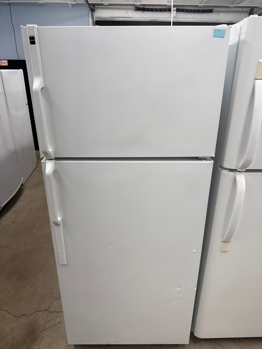 Photo 1 of this exact Hotpoint White top mount refrigerator