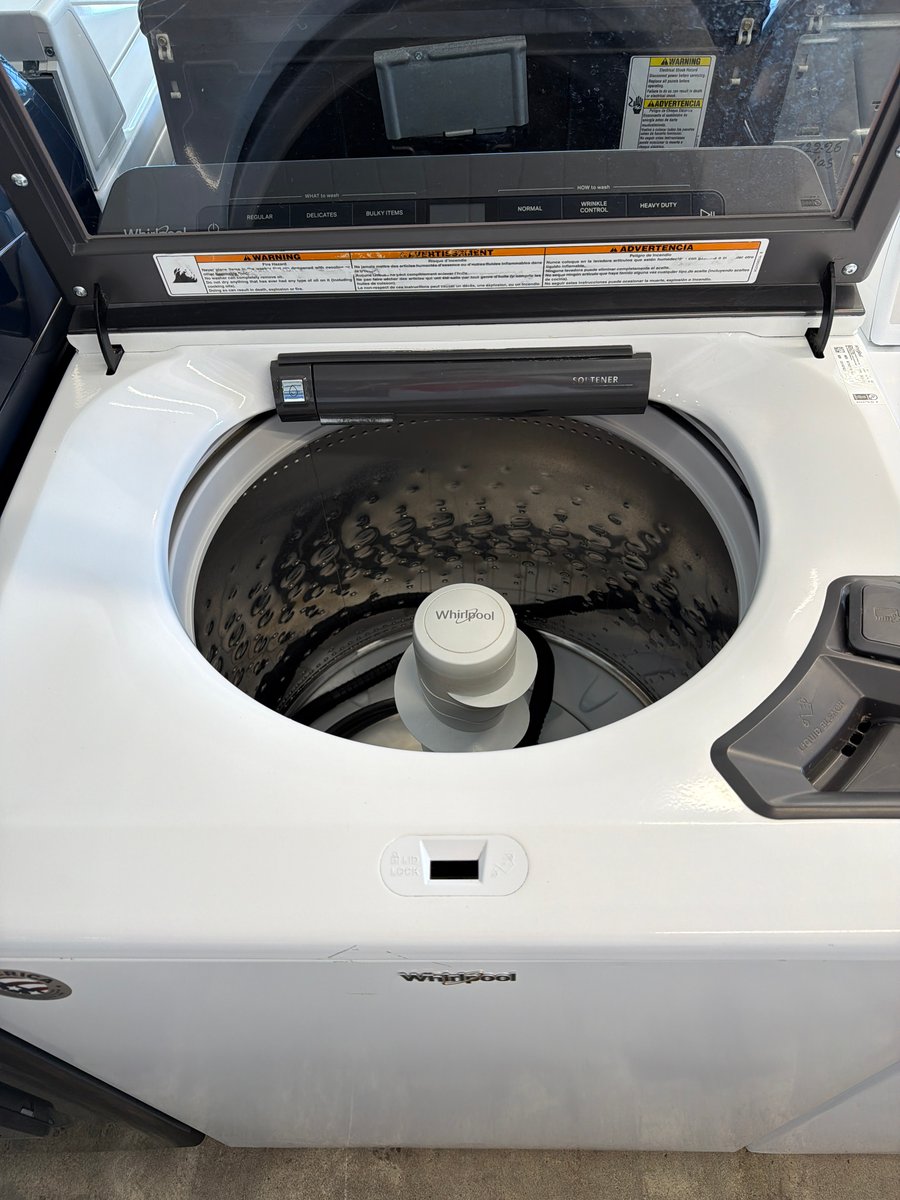Photo 2 of this exact Whirlpool TopLoad washer with agitator