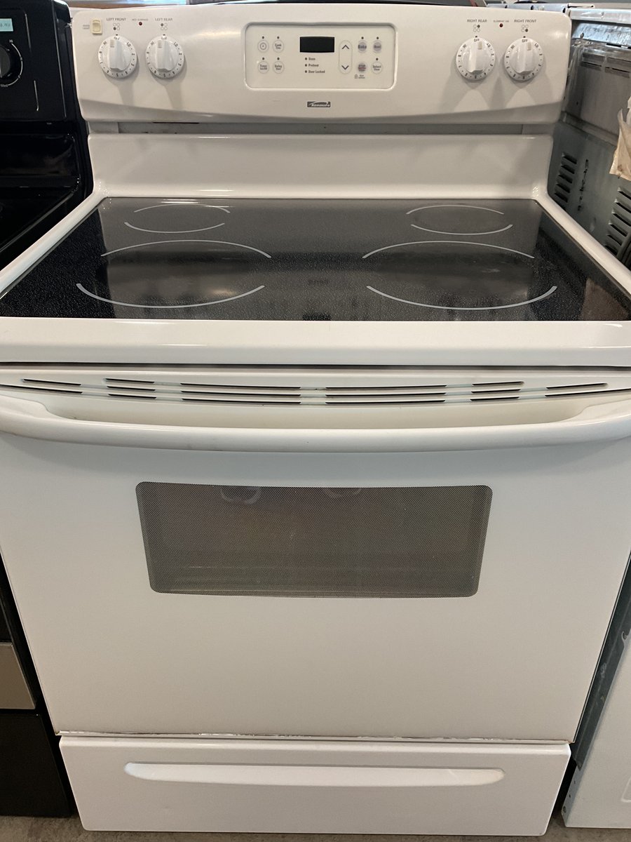 Photo 1 of this exact Kenmore White glass top range