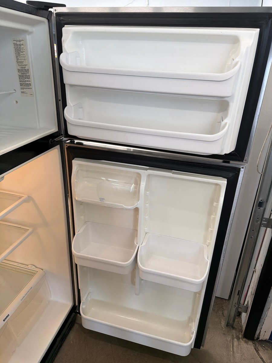 Photo 2 of this exact Kenmore 30" Top freezer Refrigerator