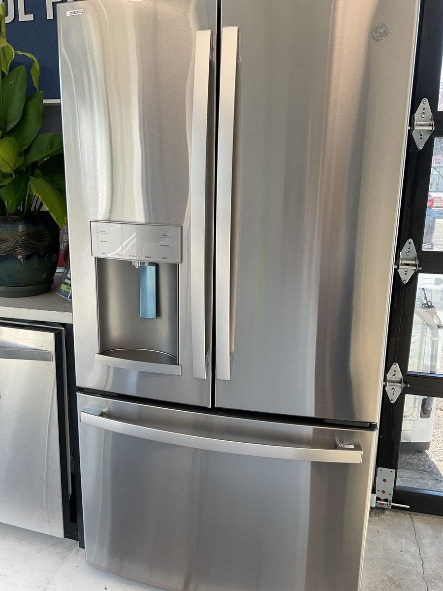 Photo 1 of this exact GE Counter depth French door stainless steel refrigerator