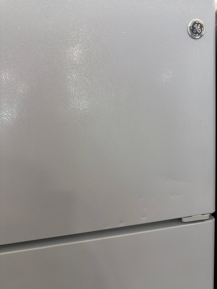 Photo 2 of this exact GE White top mount refrigerator