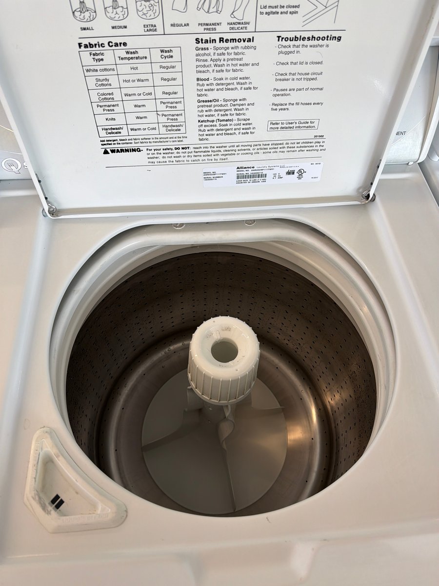 Photo 2 of this exact Speed Queen Top load washer and dryer set