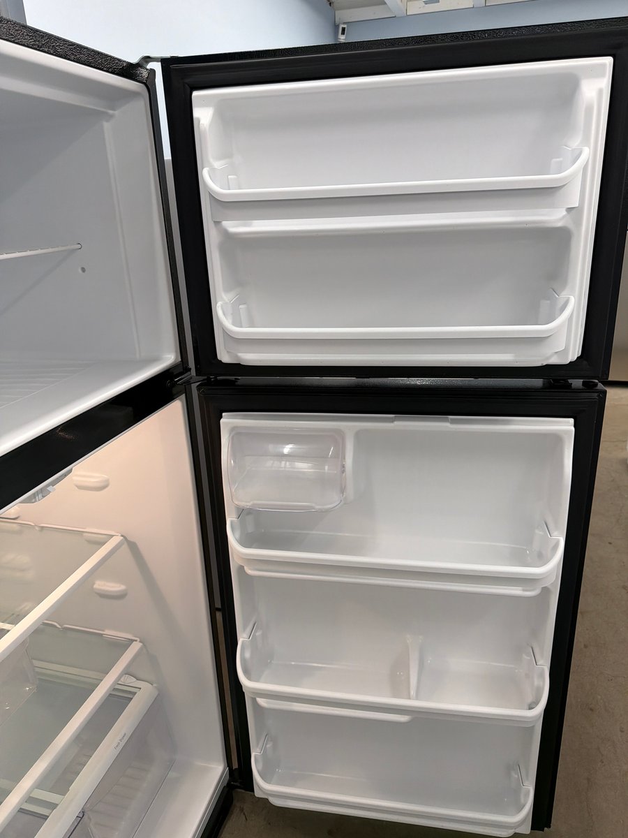Photo 3 of this exact Frigidaire Black top mount refrigerator