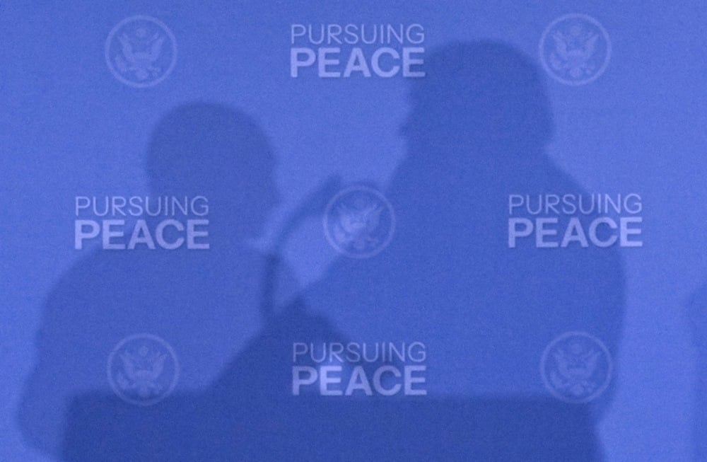 The shadows of Vladimir Putin (L) and US President Donald Trump (R) as they attend a meeting at Joint Base Elmendorf-Richardson in Anchorage, Alaska, USA, 15 August 2025. Photo: EPA/SERGEY BOBYLEV/SPUTNIK/KREMLIN POOL