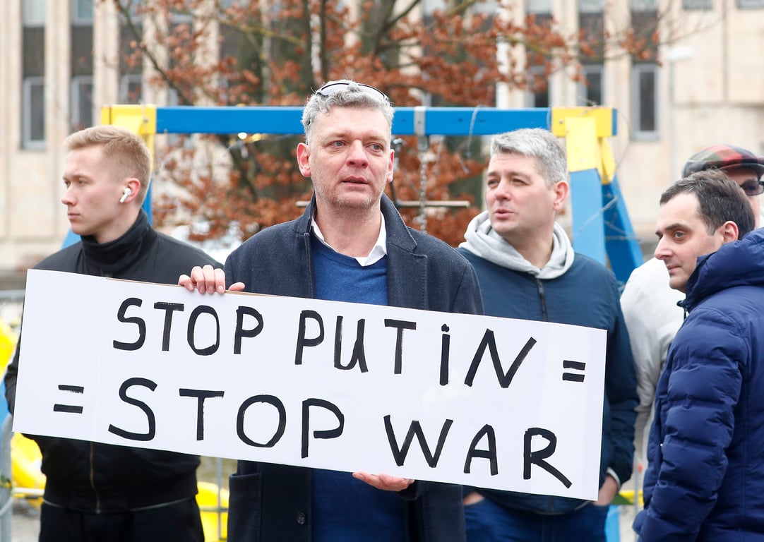 A man protests at the Russian Embassy in Riga, Latvia, 17 March 2024. Photo: EPA / TOMS KALNINS