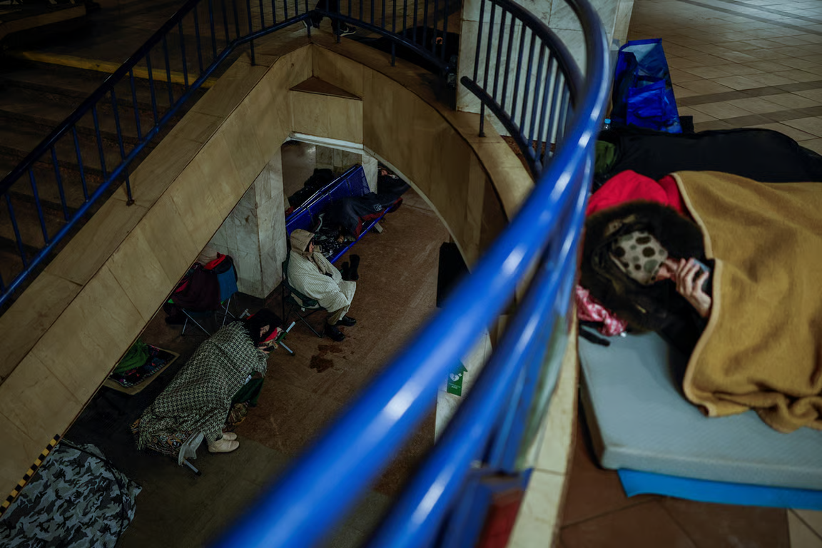 Locals seek shelter at a metro station during a Russian attack, Kyiv, Ukraine, 20 January 2026. Photo: Alina Smutko / Reuters / Scanpix / LETA