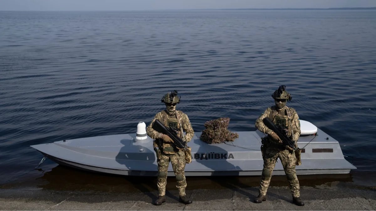 Ukrainian soldiers stand in front of a Sea Baby marine drone during a presentation by the Security Service of Ukraine in Ukraine’s Kyiv region, 5 March 2024. Photo: Evgeniy Maloletka / AP Photo / Scanpix / LETA