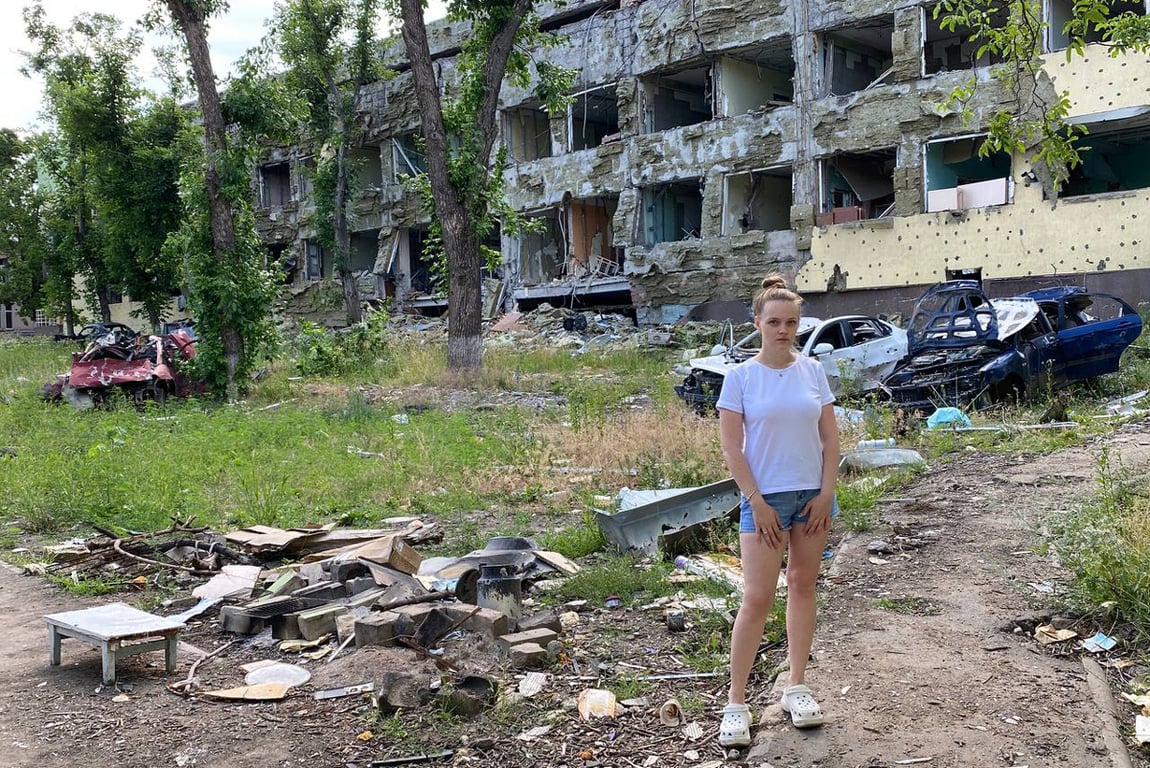 Vyshemyrska stands outside the ruins of Mariupol Maternity Hospital No. 3 in July 2022. Photo: Marianna Vyshemyrska / Telegram