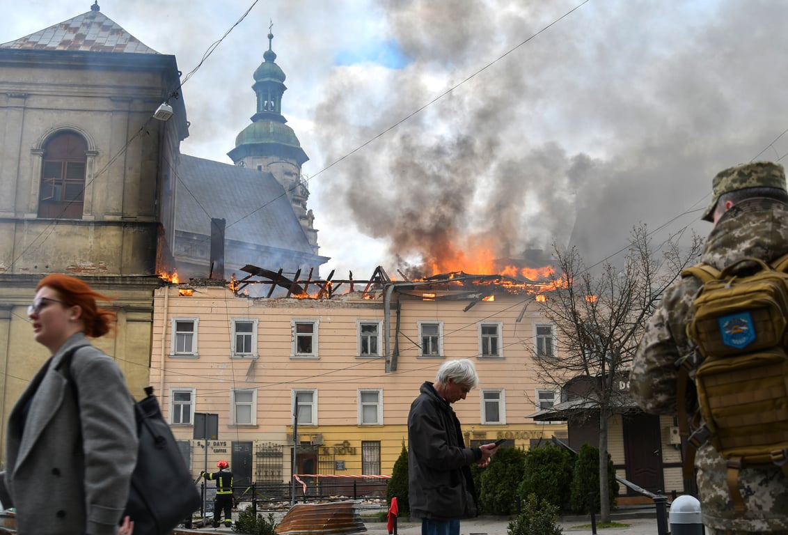 Fire blazes from the roof of a residential building next to Lviv’s Bernardine Monastery complex, in western Ukraine, 24 March 2026. Photo: EPA / Mykola Tys