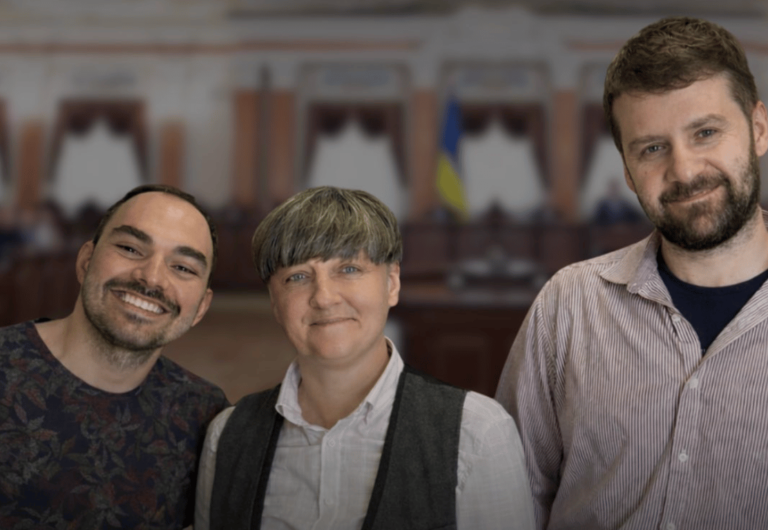 Tymur Levchuk (L) and Zoryan Kis (R) with their lawyer Oksana Guz (C). Photo: Insight LGBT