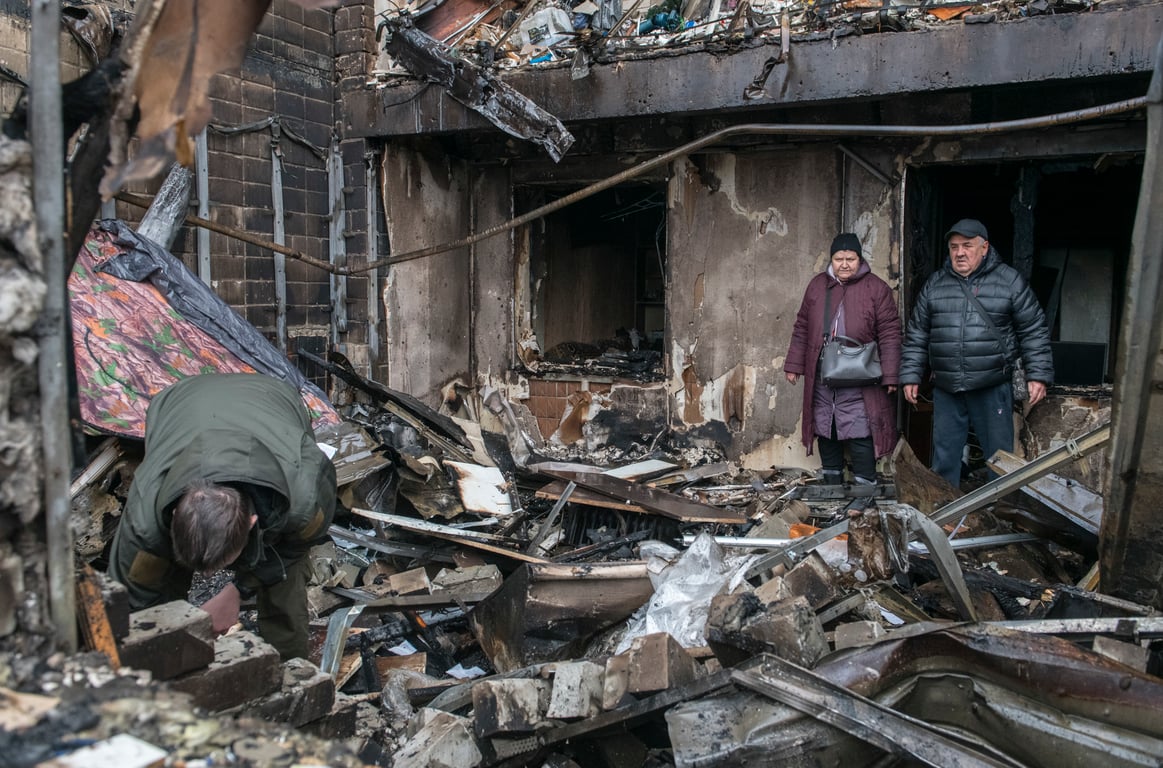 Residents survey the destruction following a Russian airstrike on a nine-storey apartment block in the Kyiv region city of Vyshhorod, Ukraine, 30 November 2025. Photo: EPA / Maxym Marusenko