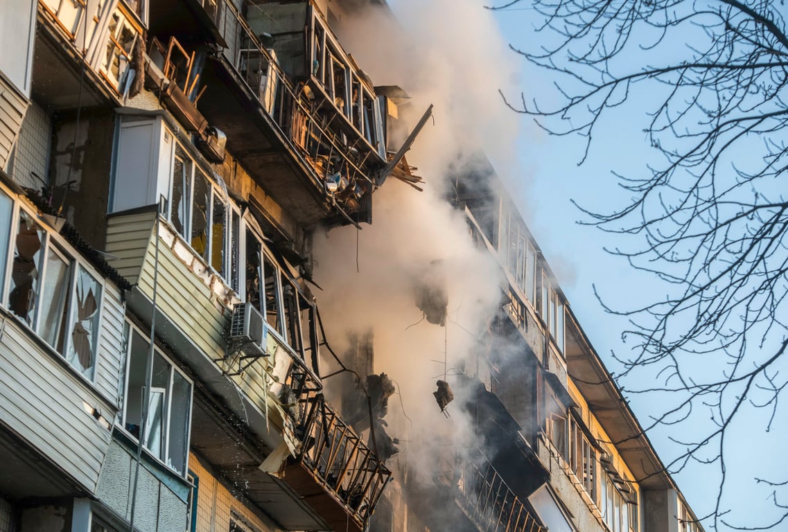 Smoke rises from a nine-storey residential building in Kyiv, following combined Russian airstrikes on the Ukrainian capital, 14 November 2025. Photo: EPA/ Maxym Marusenko