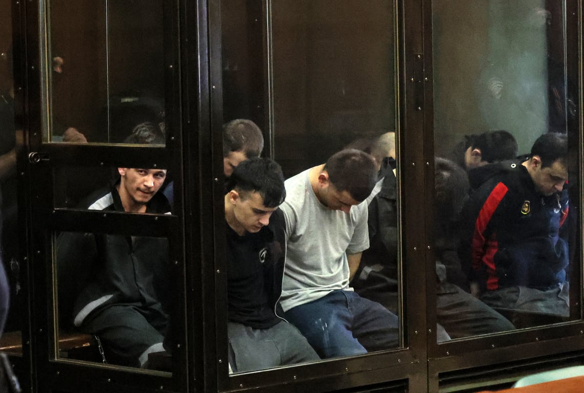 Those accused of carrying out the Crocus City Hall terror attack on trial in Moscow, 4 August 2025. Photo: EPA / YURI KOCHETKOV
