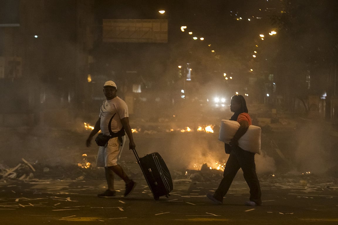 Акции протеста против правительства Венесуэлы в Альтамире, Каракас, Венесуэла, 20 февраля 2014 года. Фото: Miguel Gutierrez / EPA