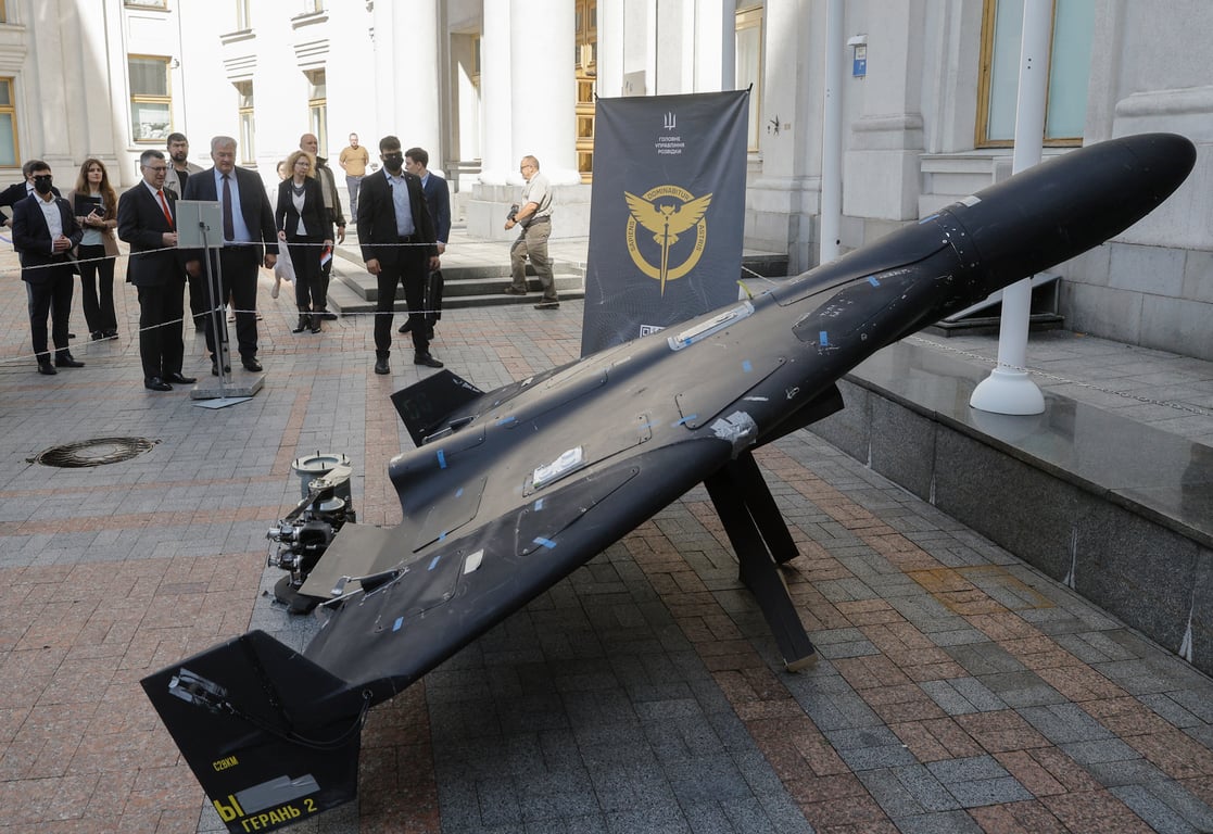 Ukraine’s Foreign Minister Andriy Sybiha surveys a Russian Shahed Geran-2 drone in front of the Foreign Ministry, Kyiv, Ukraine, 23 July 2025. Photo: EPA / SERGEY DOLZHENKO