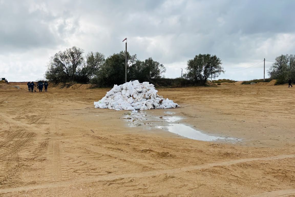 Bags filled with trash and fuel oil collected by volunteers. Photo provided by volunteers.